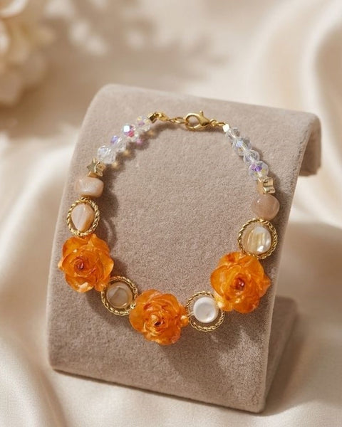 Amber Rose Elegance Bracelet – Resin Blooms with Freshwater Pearls & Gold Accents