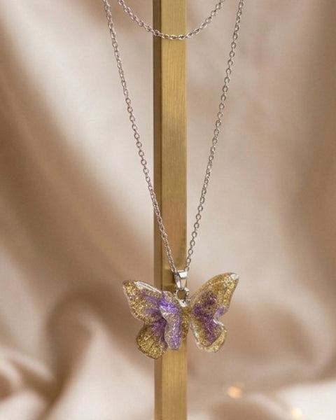Double Butterfly Resin Necklace – Gold & Silver Sparkle with Lilac Touch