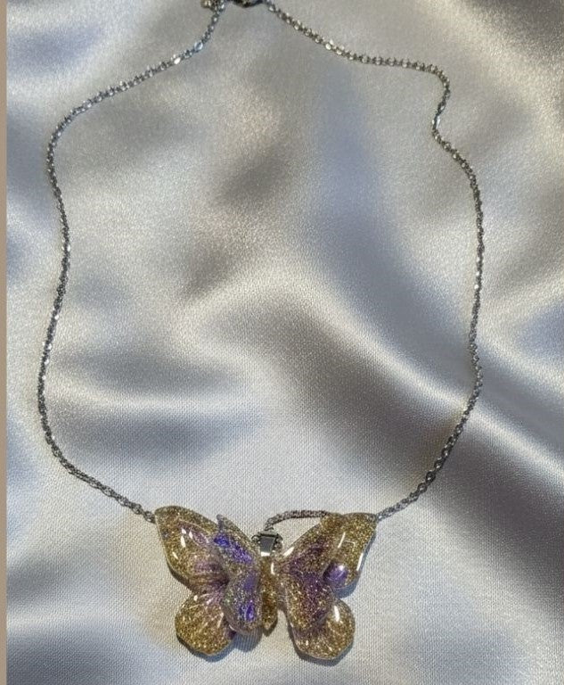 Double Butterfly Resin Necklace – Gold & Silver Sparkle with Lilac Touch